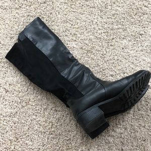 Black boot with stretch back.